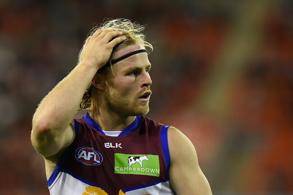 AFL 2016 Rd 16 - Gold Coast v Brisbane GOLD COAST, AUSTRALIA - JULY 09: Daniel Rich of the Lions looks on during the 2016 AFL Round 16 match between the Gold Coast Suns and the Brisbane Lions at Metricon Stadium on July 9, 2016 in Gold Coast, Australia. (Photo by Matt Roberts/AFL Media)